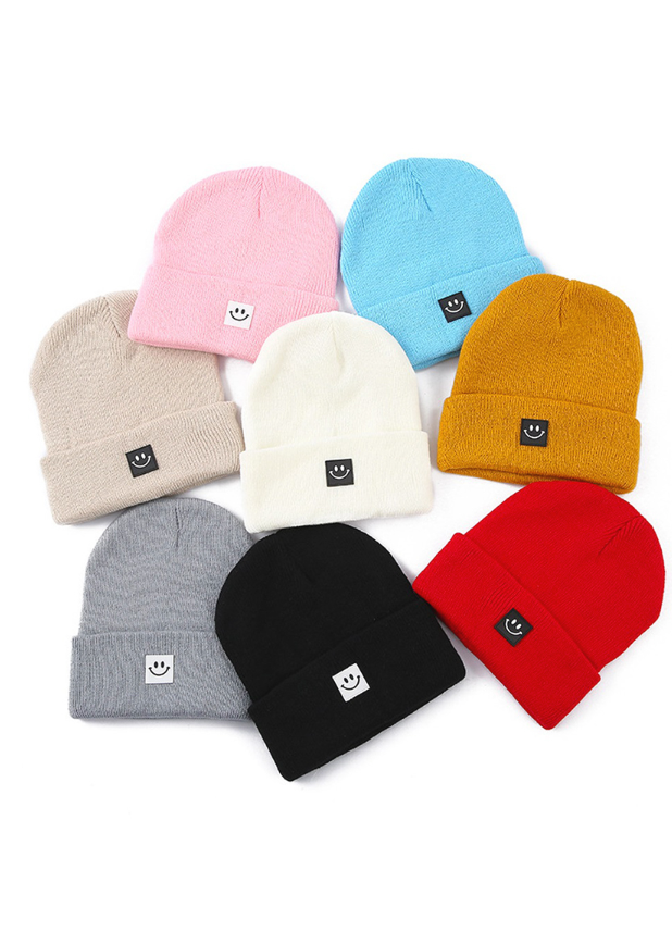 Smiley face patch beanie