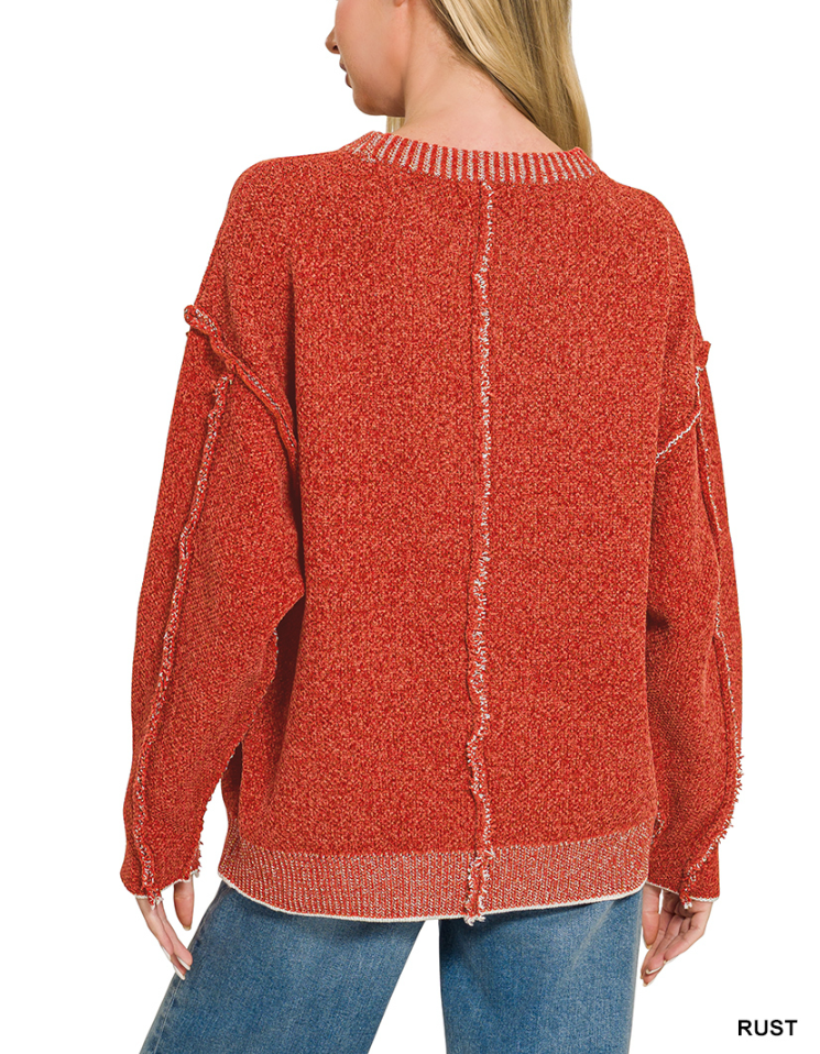 Exposed seam sweater